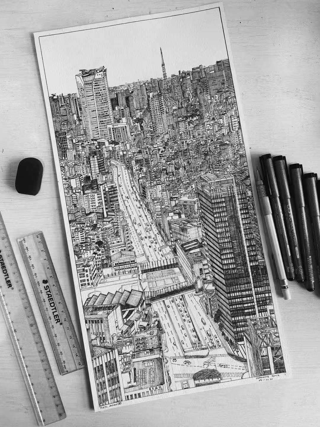black and white fineline drawing of dense city buidlings